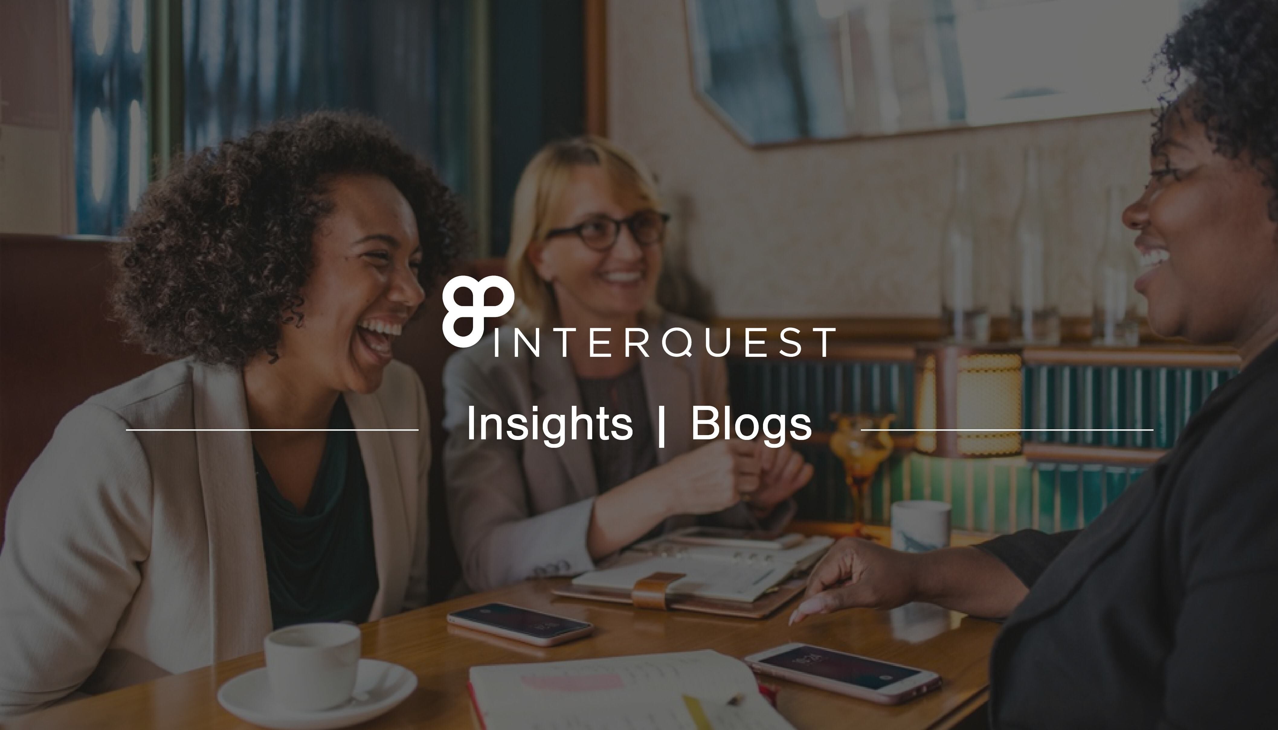 InterQuest insights blogs banner background image of three people talking at a table with cups of coffee